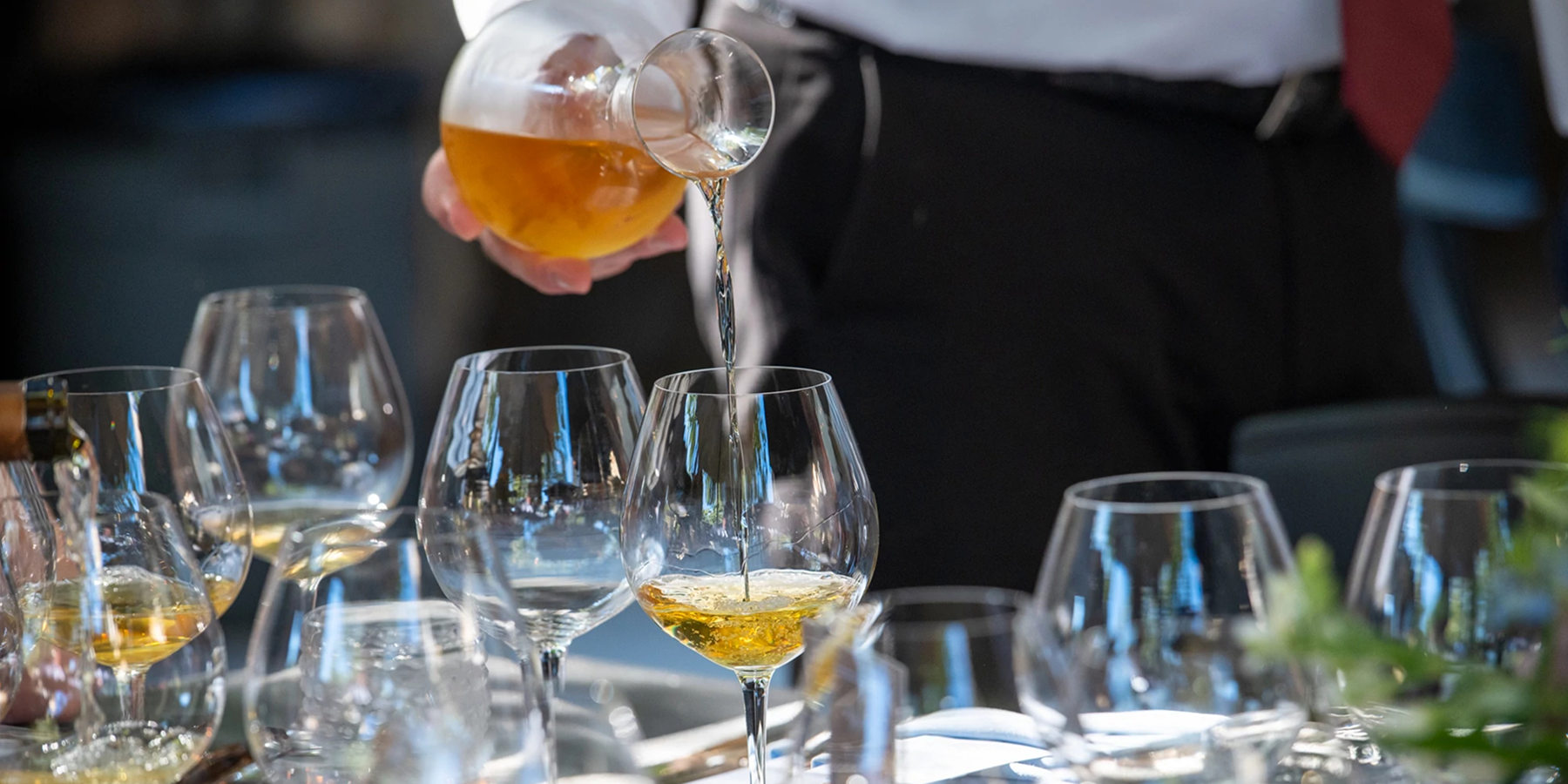 Pouring a glass of wine 
